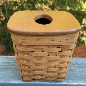 Longaberger tissue basket with a wooden lid.